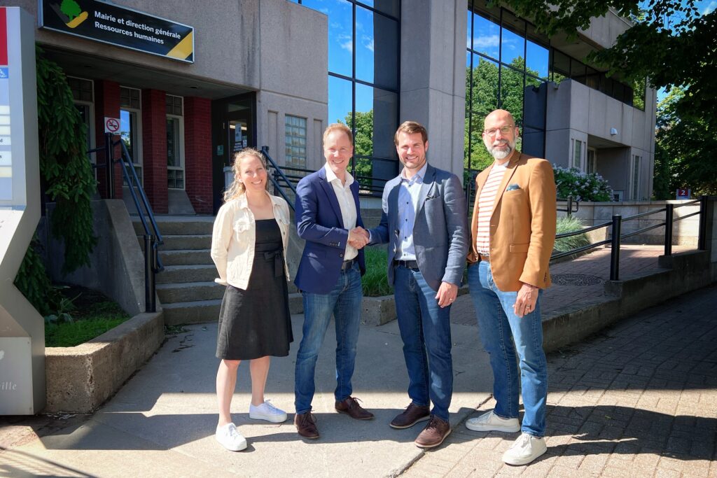 Cleo and Victoriaville meeting over project